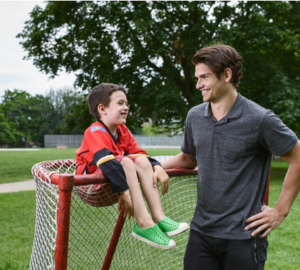 boys chatting near a hockey net BBBSC